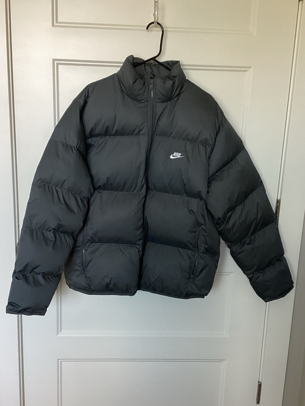 Nike Gray Quilted Puffer Jacket with White Swoosh, Primaloft fill.
